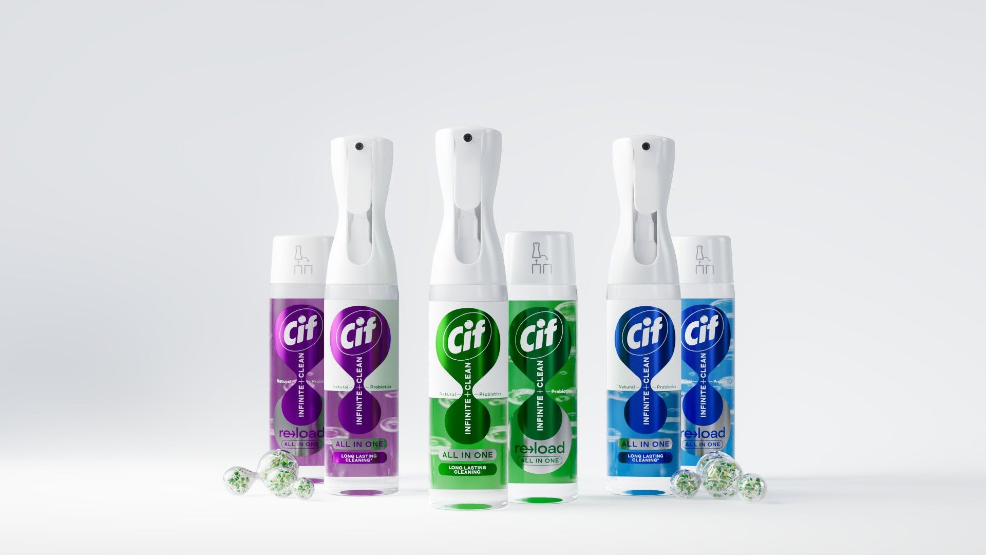 A imagem mostra três produtos de limpeza Cif em frascos de spray de plástico, com as embalagens de recarga ao lado. Existem três variantes diferentes do produto com rótulos roxos, verdes e azuis.