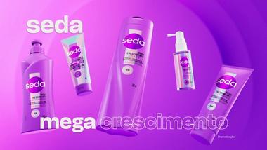 Cinco produtos da linha Seda Mega Crescimento. Frascos, bisnagas e sprays holográficos em roxo e prata. A marca exibida é Seda.